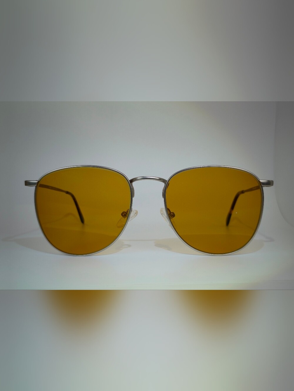 Fume. Tear Drop Metal Frame. Brushed Silver.